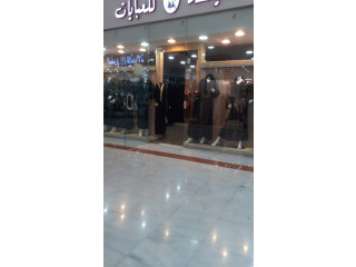 للتقبيل محل عبايات قائم